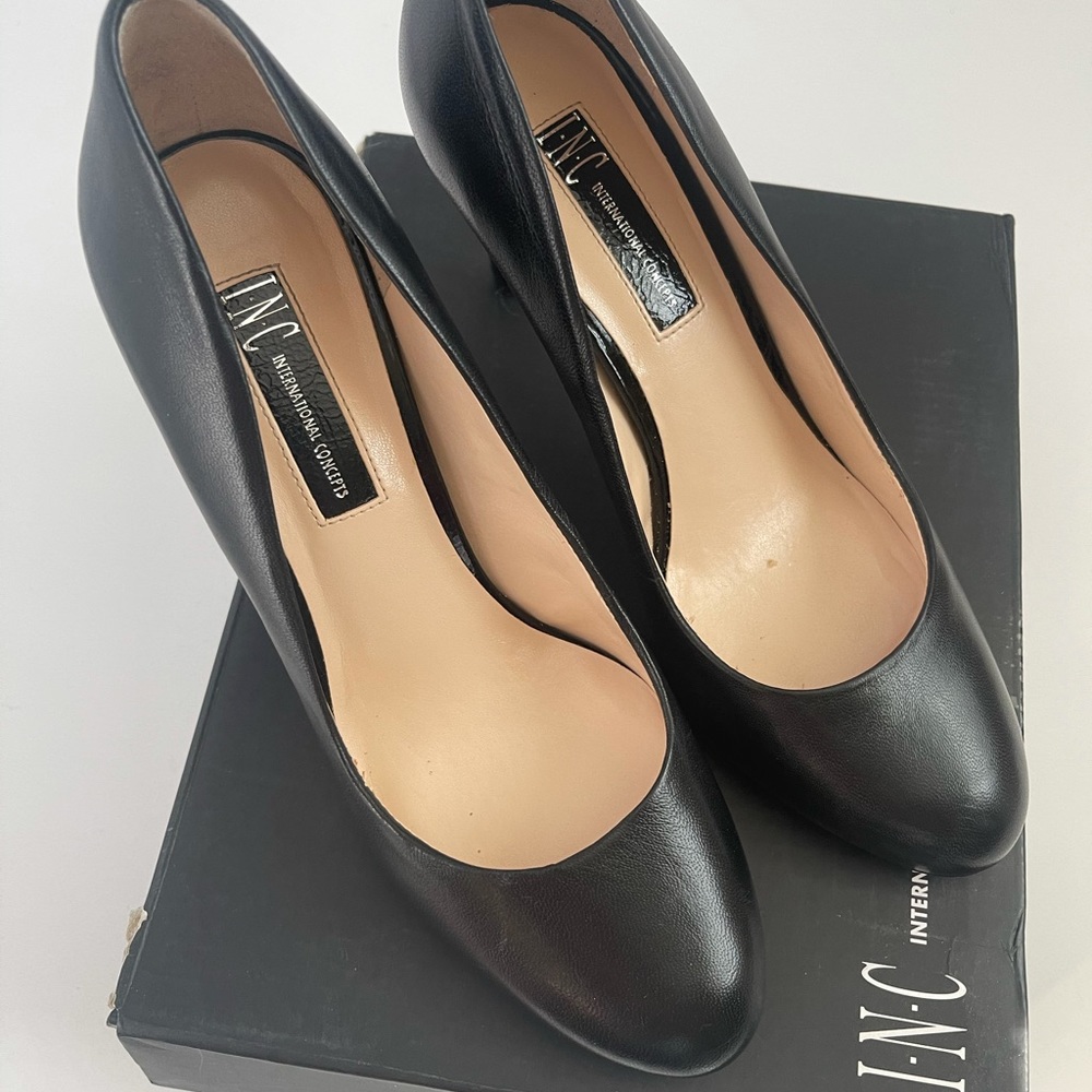 INC black round toe heels.